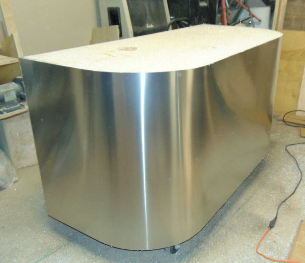Aluminum sheeting applied to 6 foot
                              round espresso cart